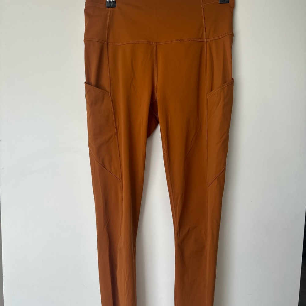BURNT ORANGE/COPPER LULULEMON fast and frees with side pockets+reflective detail